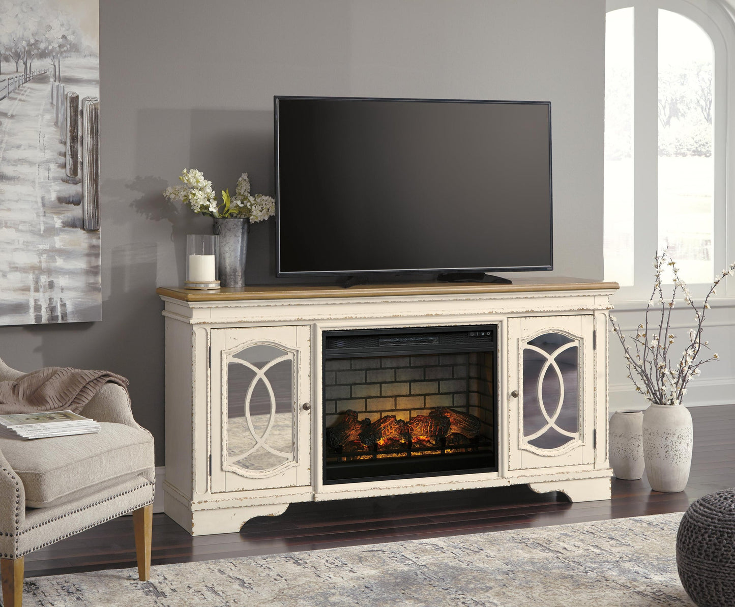 Mueble de TV Realyn de 74" con chimenea eléctrica
