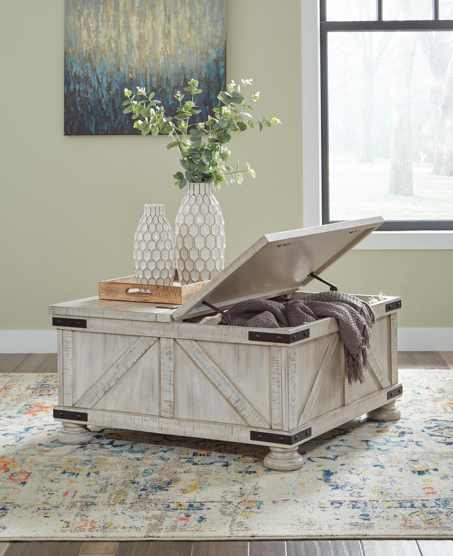 Mesa de cóctel Carynhurst con espacio de almacenamiento