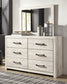 Cambeck King Panel Bed with Mirrored Dresser