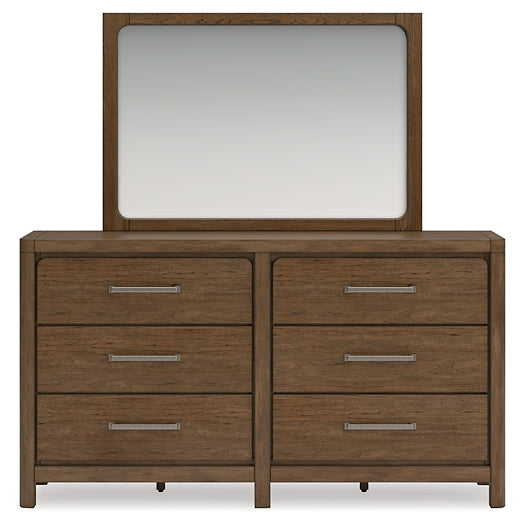 Cabalynn Queen Upholstered Bed with Mirrored Dresser and Chest
