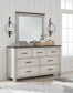 Darborn King Panel Bed with Mirrored Dresser and Chest